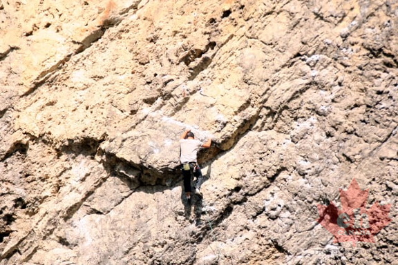 Rock Face and Climber