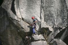 Rock Climber checking gear