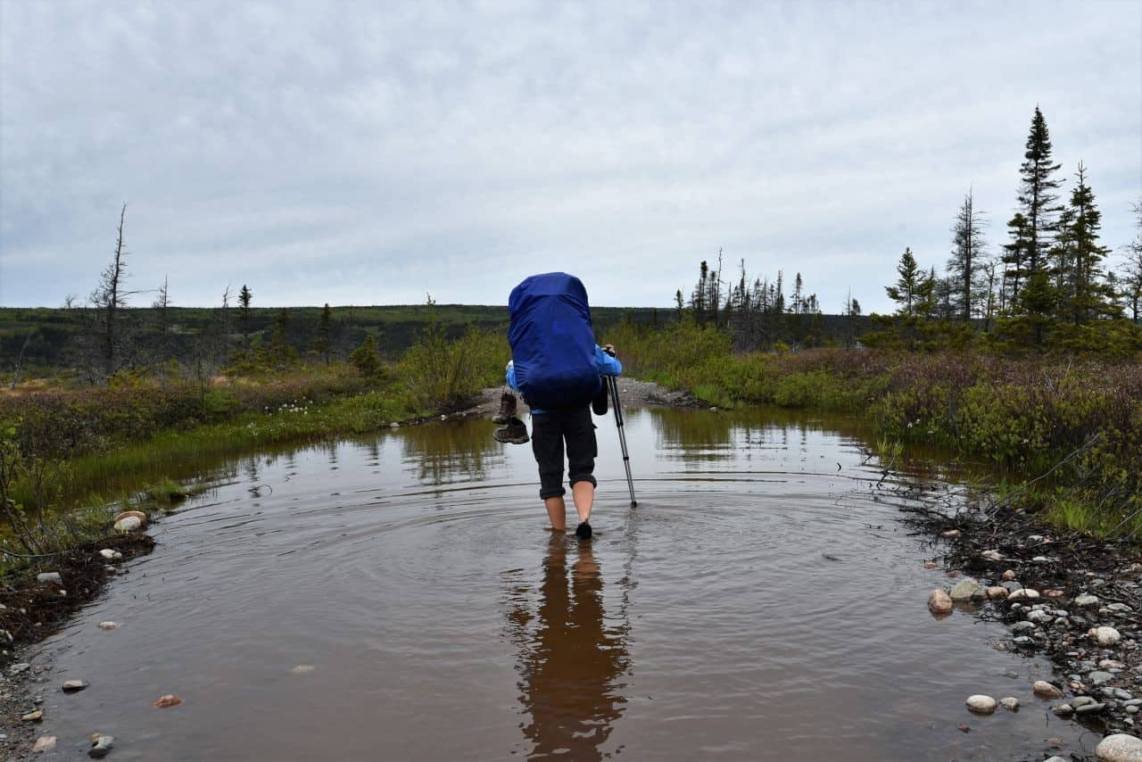 Hikers and ATVs must navigate flooded sections of the T'Railway Trail, NL after heavy rains