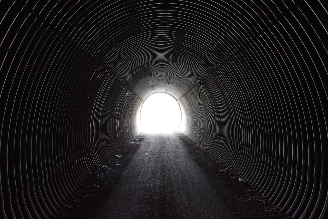 Many rounded metal tunnels act as underpasses for highways on the T'Railway Trail, NL