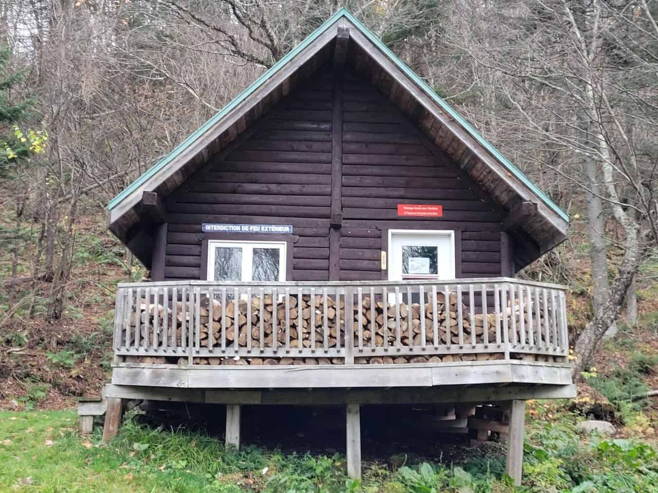 Rustic cabins and campsites on the Sentier des Caps hiking trail provide perfect accommodations for hikers and snowshoers