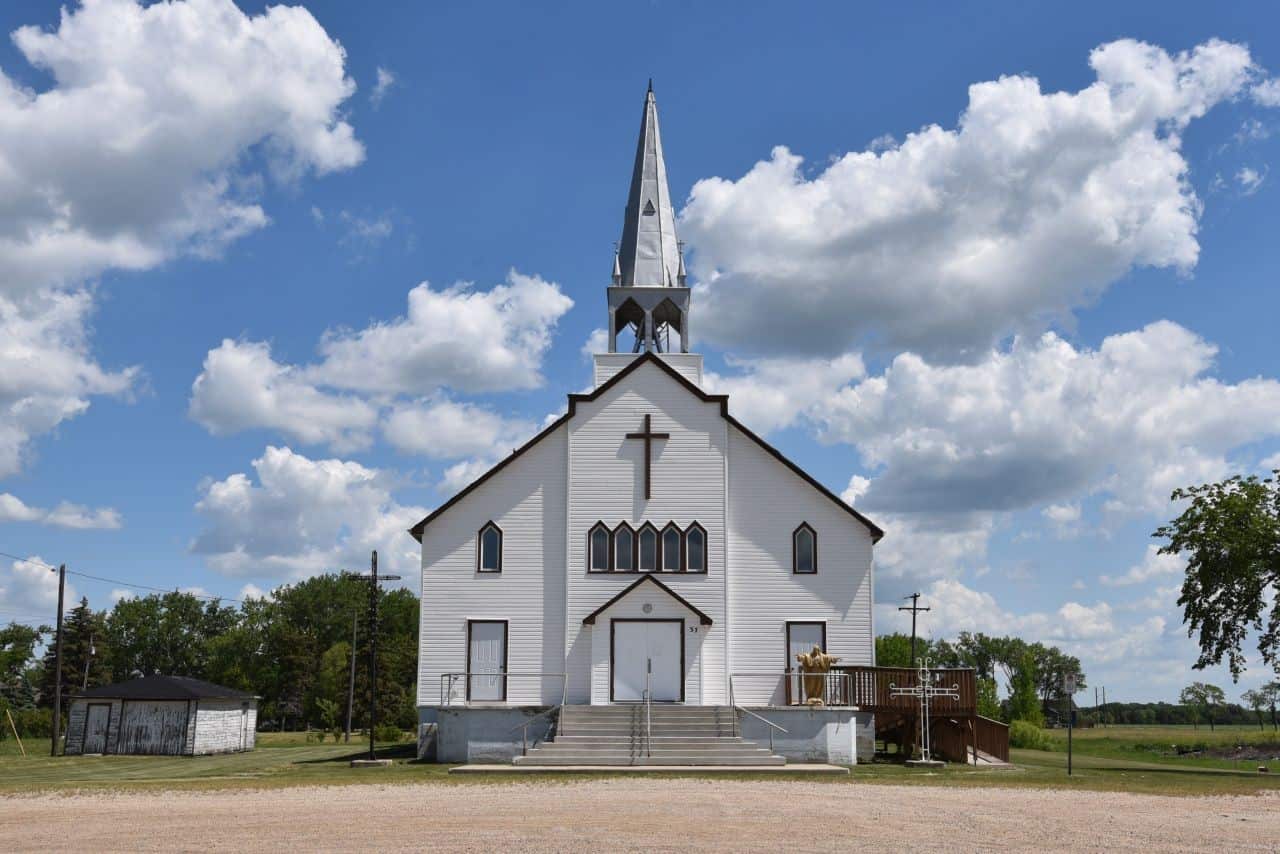 Pilgrims on the Crow Wing Trail camino portion of the Trans Canada Trail in Manitoba can make stops in churches along the way like the one in St Pierre-Jolys, MB.