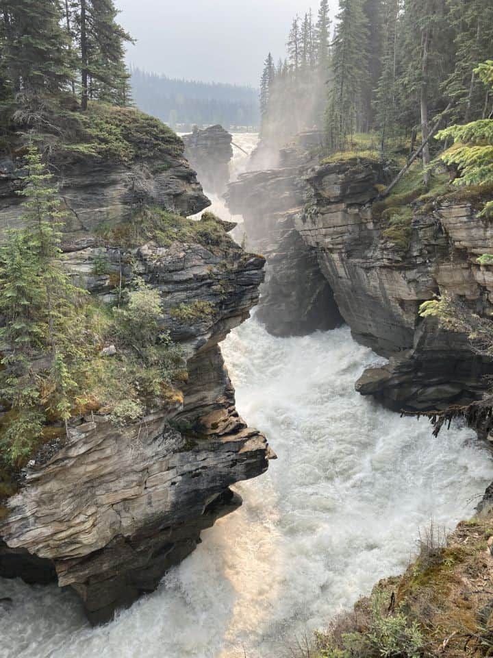 At 23m in height, Athabasca Falls are not the tallest falls in the Park but they are considered to be the most powerful. The falls are accessible by car or tour from Jasper. The trails are paved and lead to all the best viewing spots.