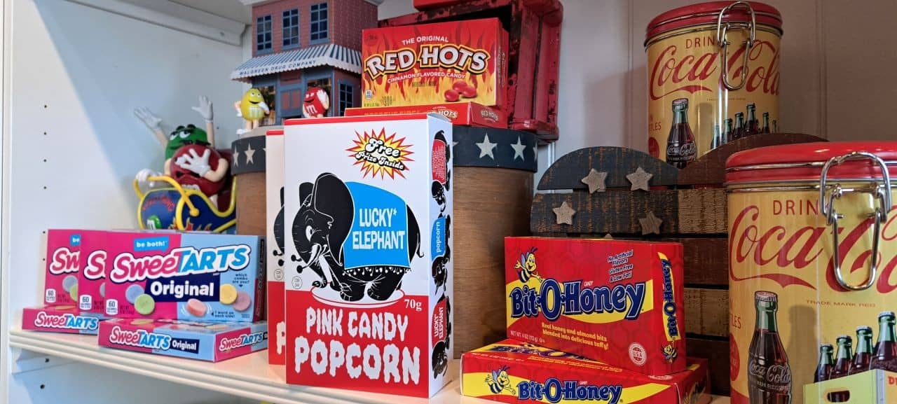 Pink Candy Popcorn, Red Hots and Sweet Tarts candy selections at Into Chocolate