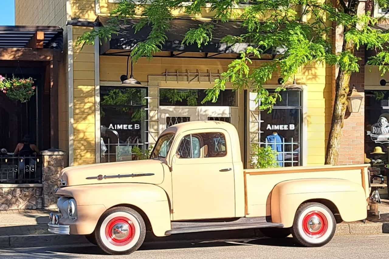 A vintage truck parked on the street in Fort Langley's historic Village