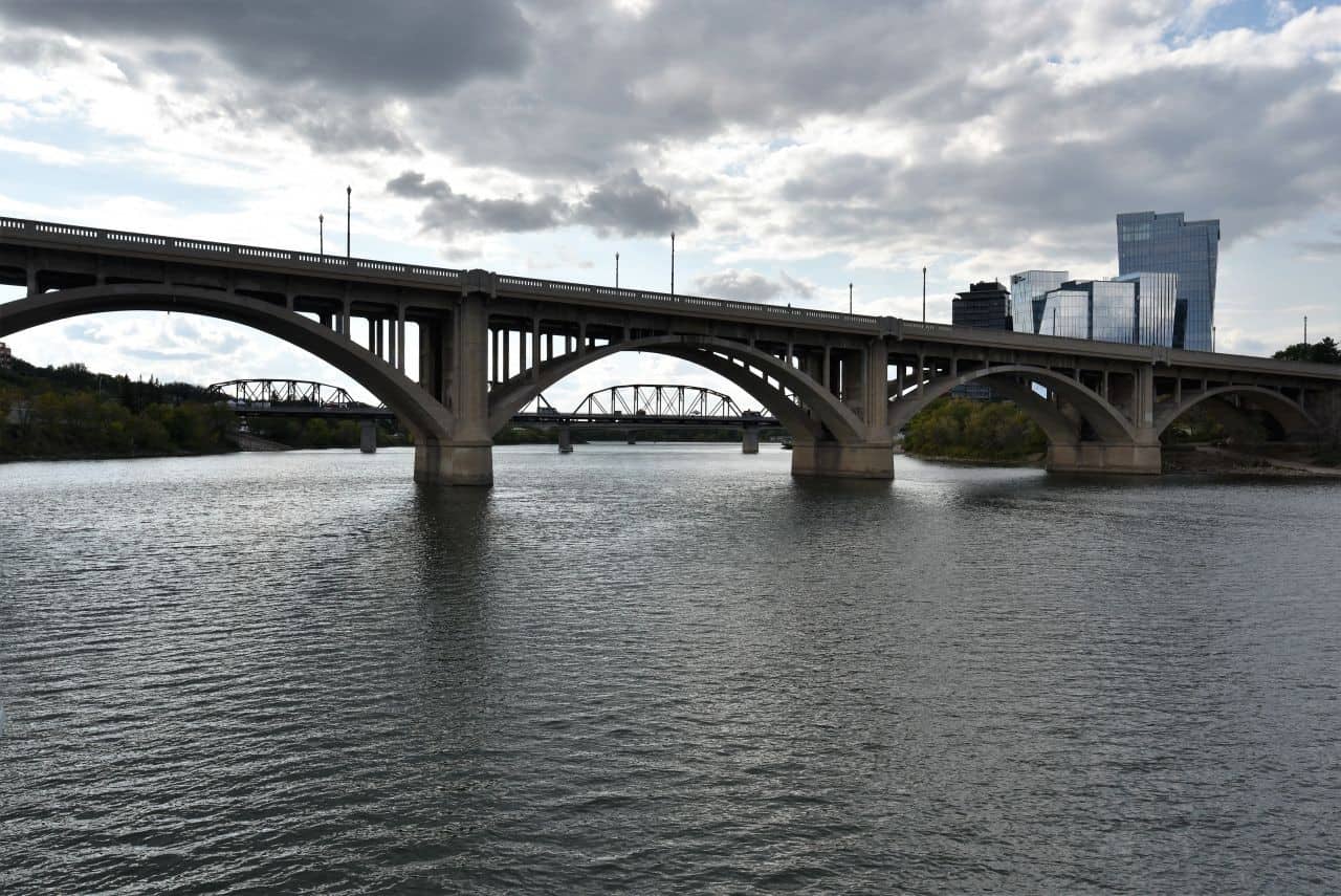 The Meewasin Trail follows the riverfront walkway through  downtown Saskatoon, offering stunning views of the nine bridges that gave the city its nickname 'Paris of the Prairies.'