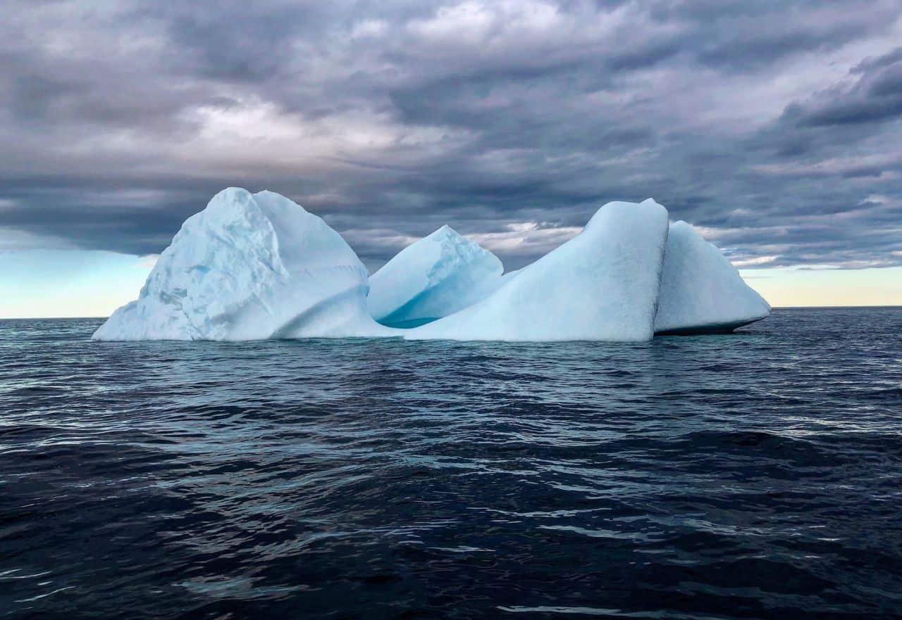 Iceberg icebergs clouds stormy weather nl Newfoundland Labrador canada island east coast maritimes berg bergy bergs