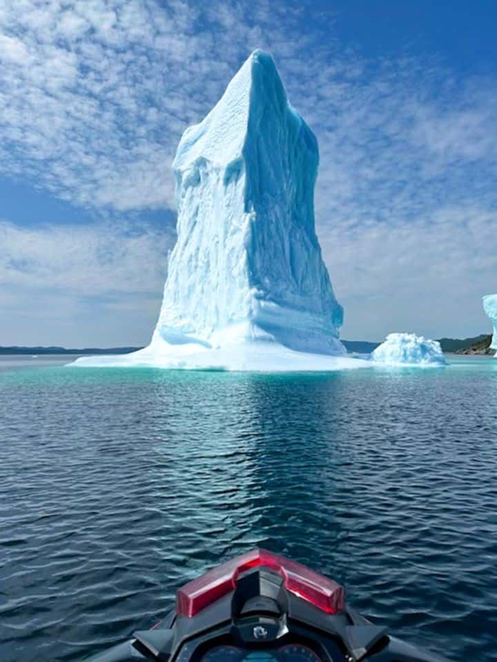 Iceberg Alley - Newfoundland and Labrador Canada Iceberg Chasing by skidoo on the Atlantic Coast.