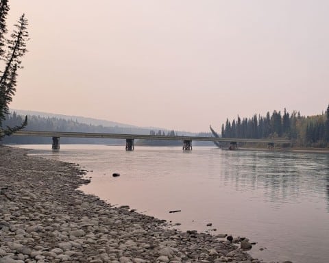 A view of the Emerson Road Bridge as it crosses over the Athabasca River in Sundance Provincial Park Alberta Canada