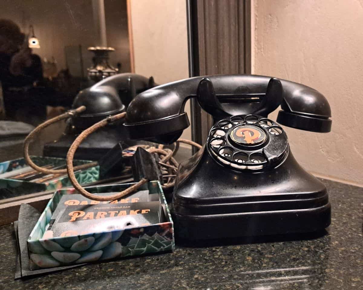 An old fashioned telephone adds some charm to Partake's cozy, rustic French restaurant on 124 Street in Edmonton