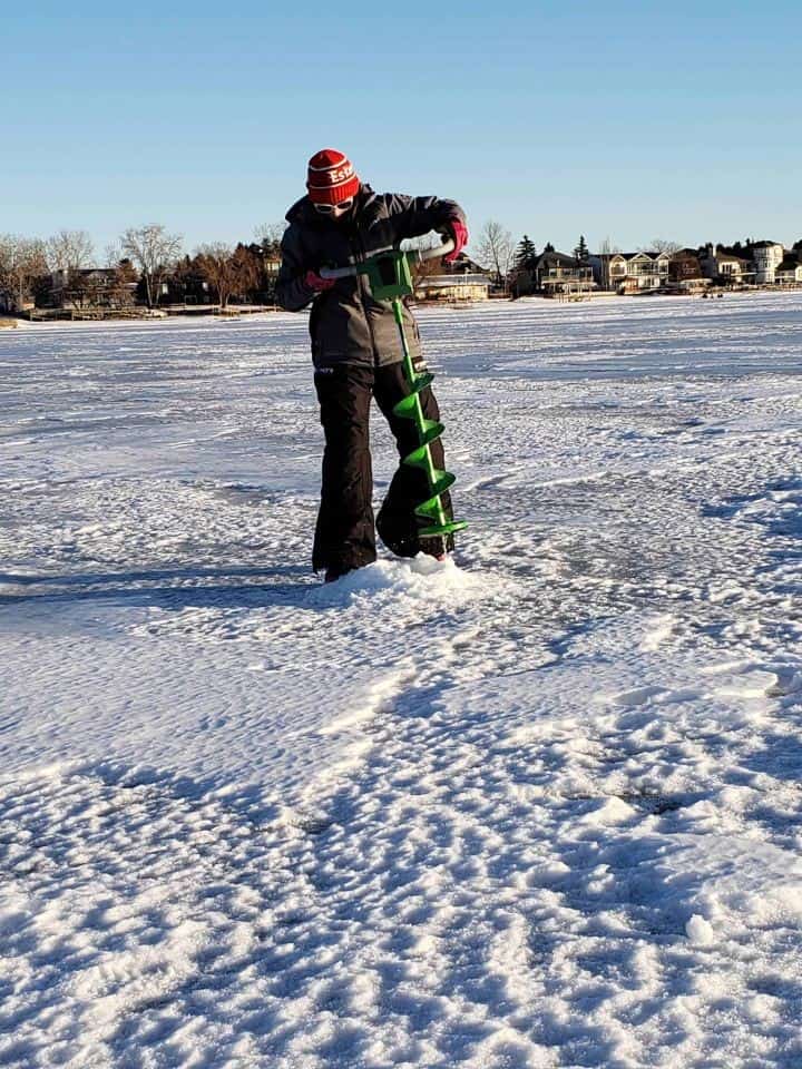 Ice fishing close to Calgary Alberta Canada. Chestermere Lake is a small lake located east of Calgary with northern pike to catch.