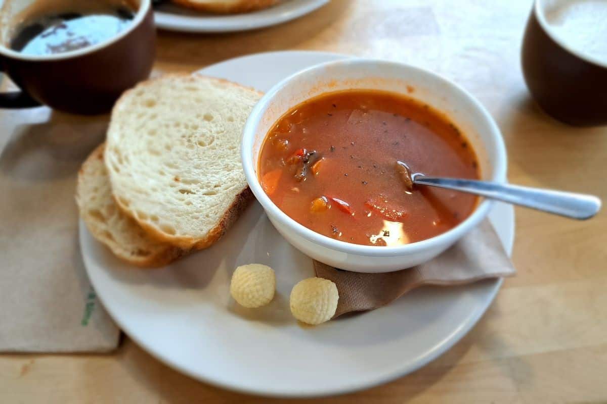 A hot cup of coffee and freshly made bowl or soup are the perfect way to warm up with a hot lunch after spending a morning snowshoeing in Banff National Pakr.