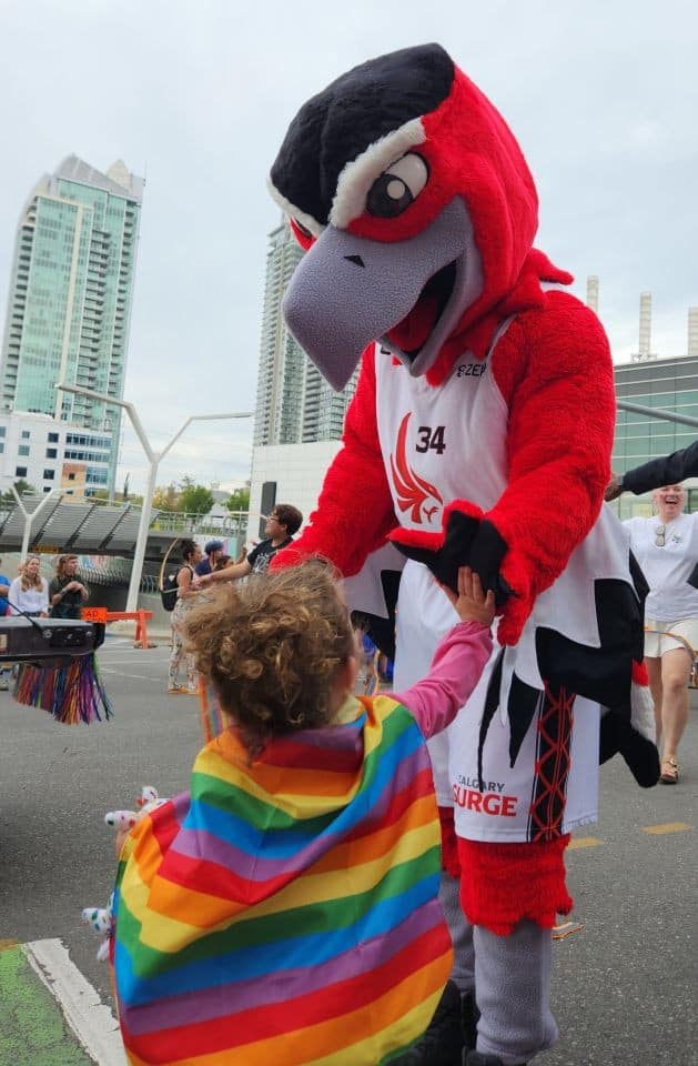 Sergio from Calgary Alberta's basketball team, the Calgary Surge, was spotted downtown taking part in the pride parade in September 2023. Many sports teams offer season tickets with many perks.