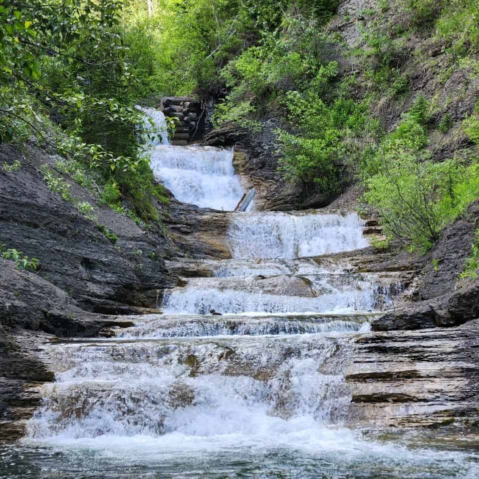 Allison Creek Falls is one of the many beautiful waterfalls in the Crowsnest Pass of Alberta Canada. There are many waterfalls in this region of our Canadian Rocky Mountains.