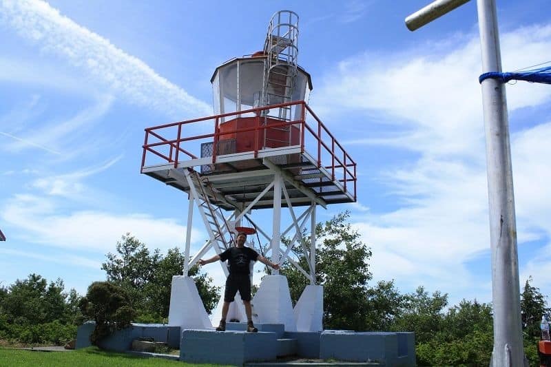 Backpacking and lighthouse at the end of the Cape Scott Trail in British Columbia.