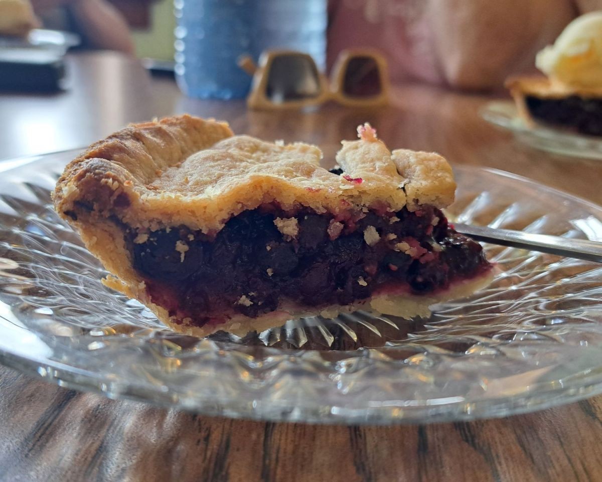 A fresh slice of homemade Saskatoon berry pie from the Bunkhouse Cafe at the Claybank National Historic Site near Moose Jaw Saskatchewan