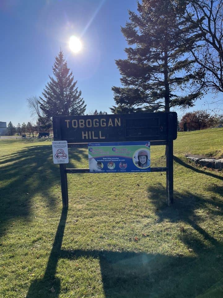 The sign at the Walter Baker Park Toboggan Hill, Kanata, Ontario.