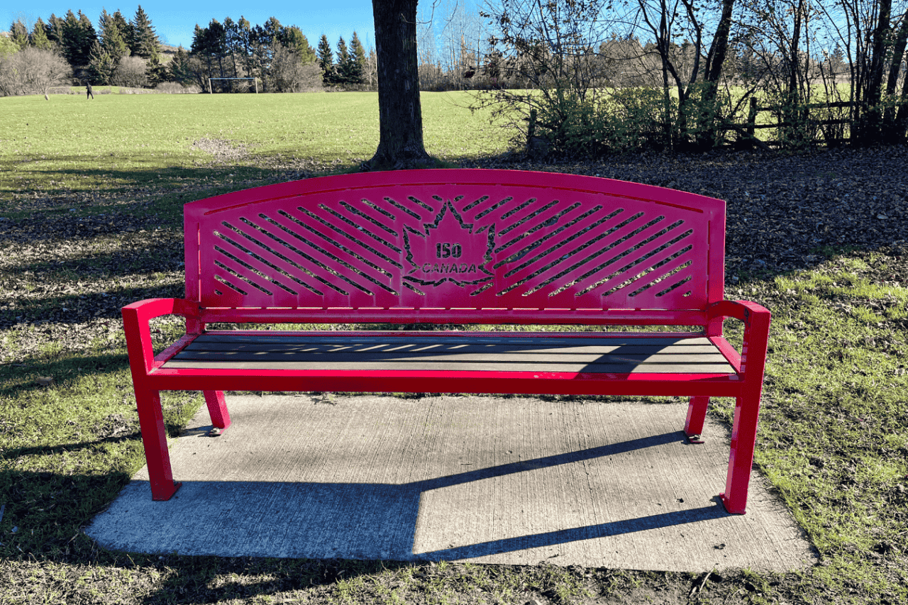 Among the variety of benches and seating at Walter Baker Park was this bright red bench commemorating Canada's 150th anniversary.