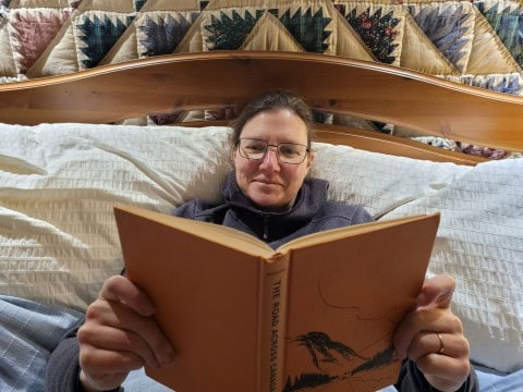 Adventure Seeker Sonya Richmond enjoying a top pick on our list of 10 Canadian travel books to inspire your next adventure in 2025.