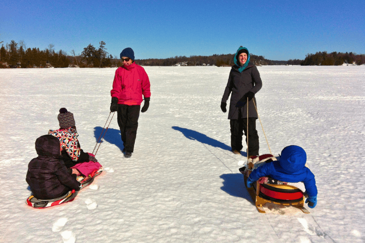 Dog Lake, frozen over the winter, is perfect for walking and sledding across.