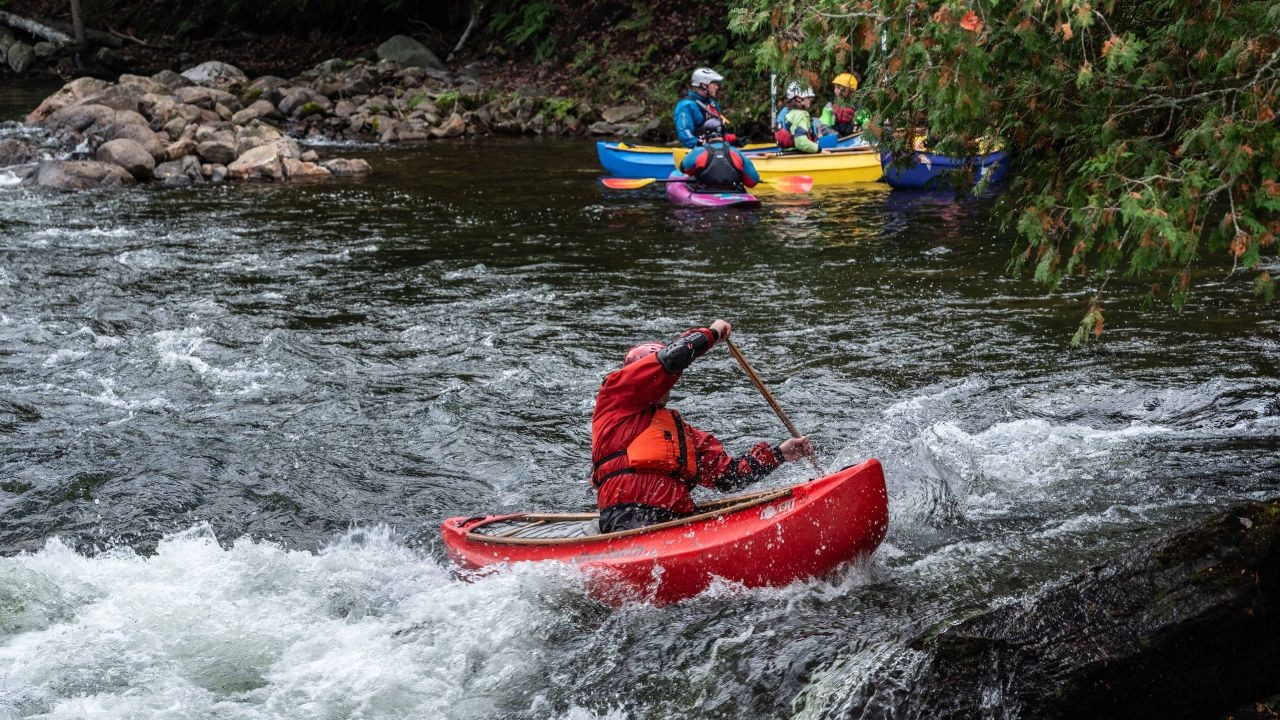 Kayaker in the whitewater in at Minden whitewater preserve  in Ontario Canada.