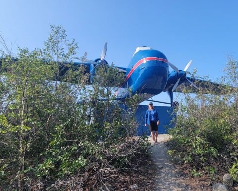 A blue Brisotl Air Freighter mnumnet welcomes travelers to Yellowknife NWT Canada