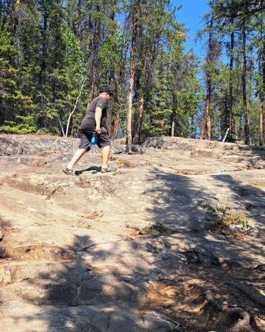 It is a rugged trail that leads adventure seekers to the Cameron River Waterfall on the Ingraham Trail in NT Canada.