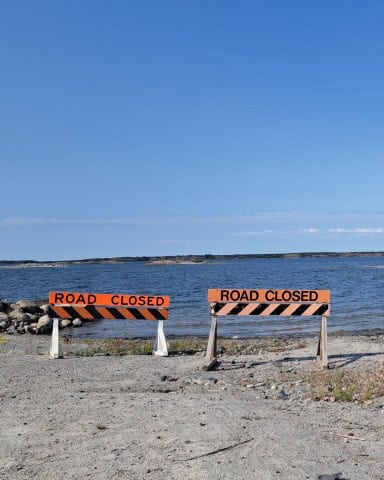 The Dettah Ice Road is barricaded and closed for the summer in the Northwest Terrritories.