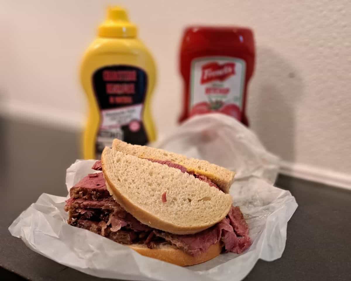 A Montreal smoked meat sandwhich on rye bread from Schwartz's Deli is an iconic Montreal food.