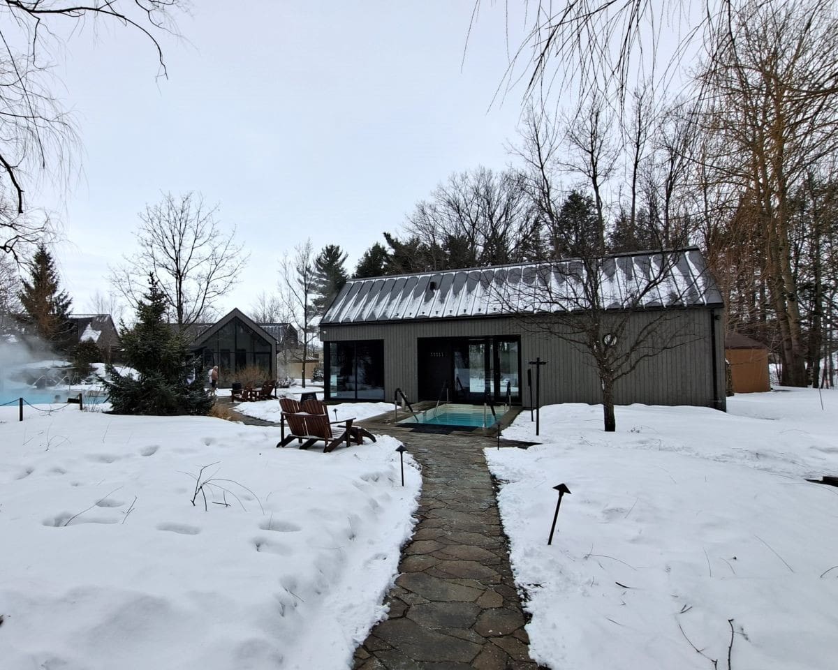 Stone pathways lead spa goers from one Nordic spa cycle to the next. This building includes a dry sauna, cold pool and relaxation area.