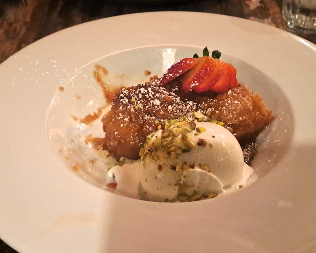 A traditional French Canadian maple syrup dessert called pudding chomeur is served with ice cream at Bistro Barabouf in Beloil, south of Montreal QC Canada