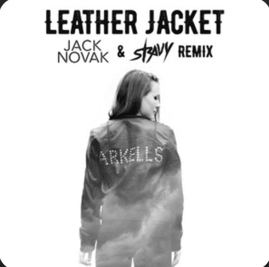 A young woman wearing a leather jacket that says 