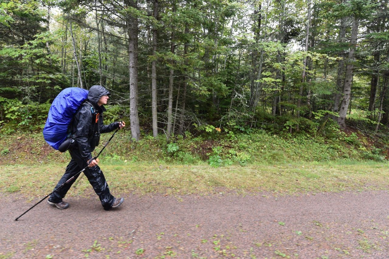 Sonya tests her rain gear in the heart of a downpour on the Trans Canada Trail. Layering waterproof outerwear is key for staying dry and comfortable during Canada’s unpredictable weather.