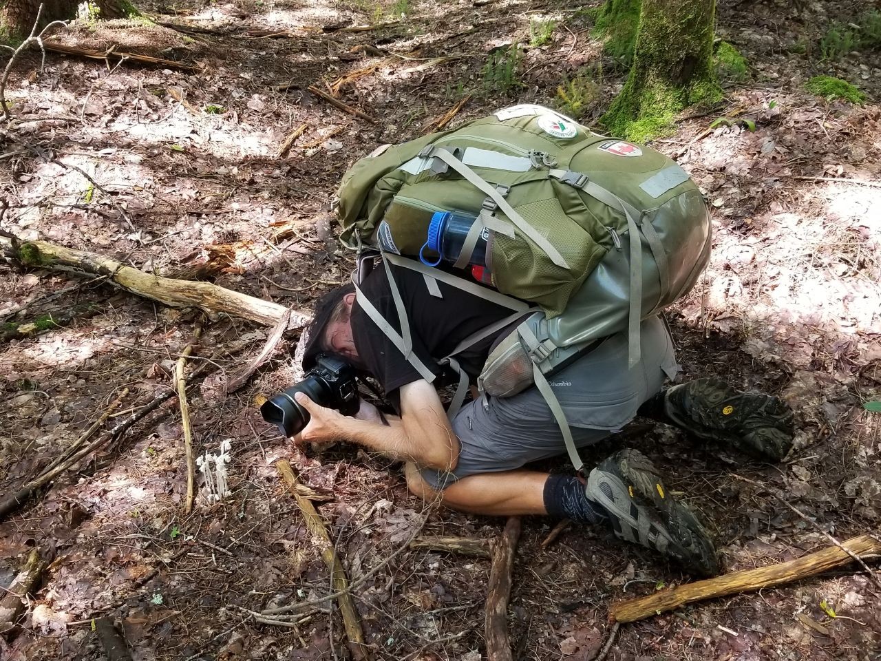 Sean pauses to capture the stunning landscapes along the Trans Canada Trail, using his DSLR to document every moment of our adventure, blending technology and nature in perfect harmony.