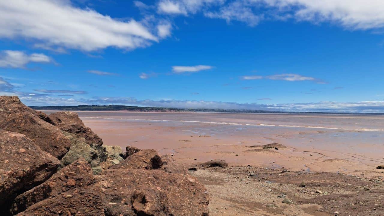 Wheelchair accessible mud flats at North Beach in Hopewell Rocks Provincial Park, New Brunswick, exposed at low tide along the Bay of Fundy.