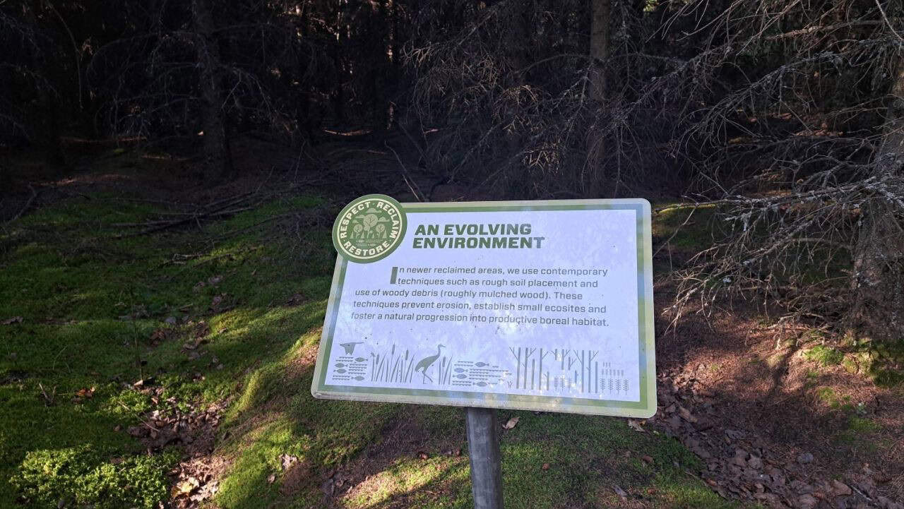 Interpretive signs along the Gateway Hill trail system explain the reclamation process for oil sands operations