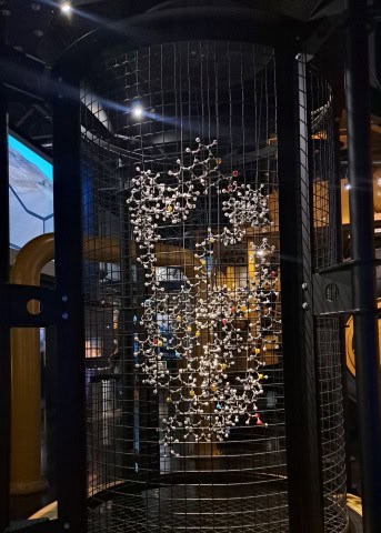 A 3D model of an asphaltene molecule on display at the Oil Sands Discovery Centre. Asphaltene is found in crude oil