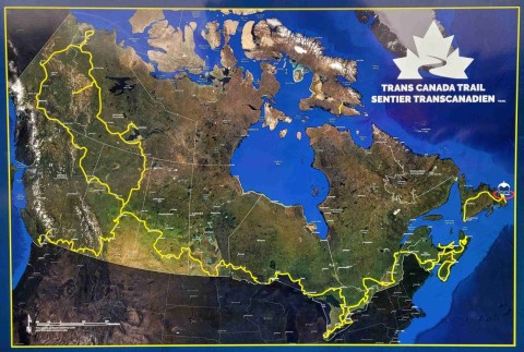 Map of the Trans Canada Trail illustrating its coast-to-coast-to-coast route across all provinces and territories, connecting communities and landscapes through a vast multi-use recreational trail network spanning over 28,000 kilometres.