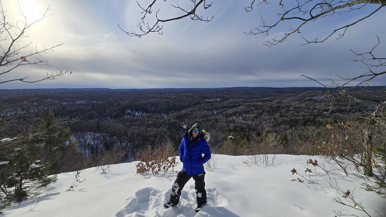 Snowmobile stop at Redbridge Lookout along the OFSC Snow Explorers Route near North Bay Ontario