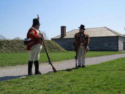 Historical reenactment at Fort George National Historic Site in Niagara-on-the-Lake, Ontario, highlighting War of 1812 history with costumed interpreters, military demonstrations, and immersive heritage experiences along the trail.