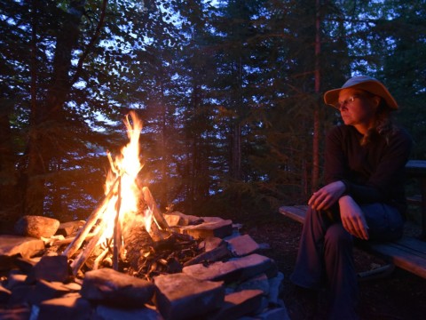 Campfire at a backcountry campsite along the Kabeyun Trail in Sleeping Giant Provincial Park near Thunder Bay, representing overnight hiking experiences, campsite routines, and wilderness safety practices in Northern Ontario.