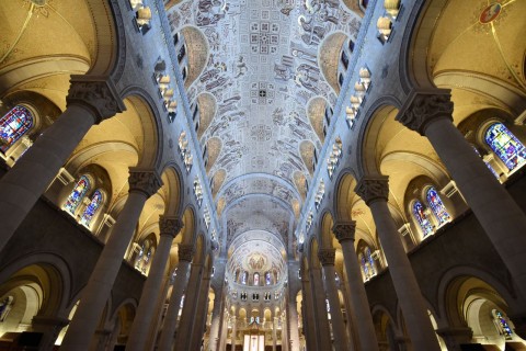 The interior of Basilica of Sainte-Anne-de-Beaupré reflects the spiritual heritage of Quebec Camino routes, where pilgrims experience historic churches, sacred spaces, and cultural traditions along the St. Lawrence River.
