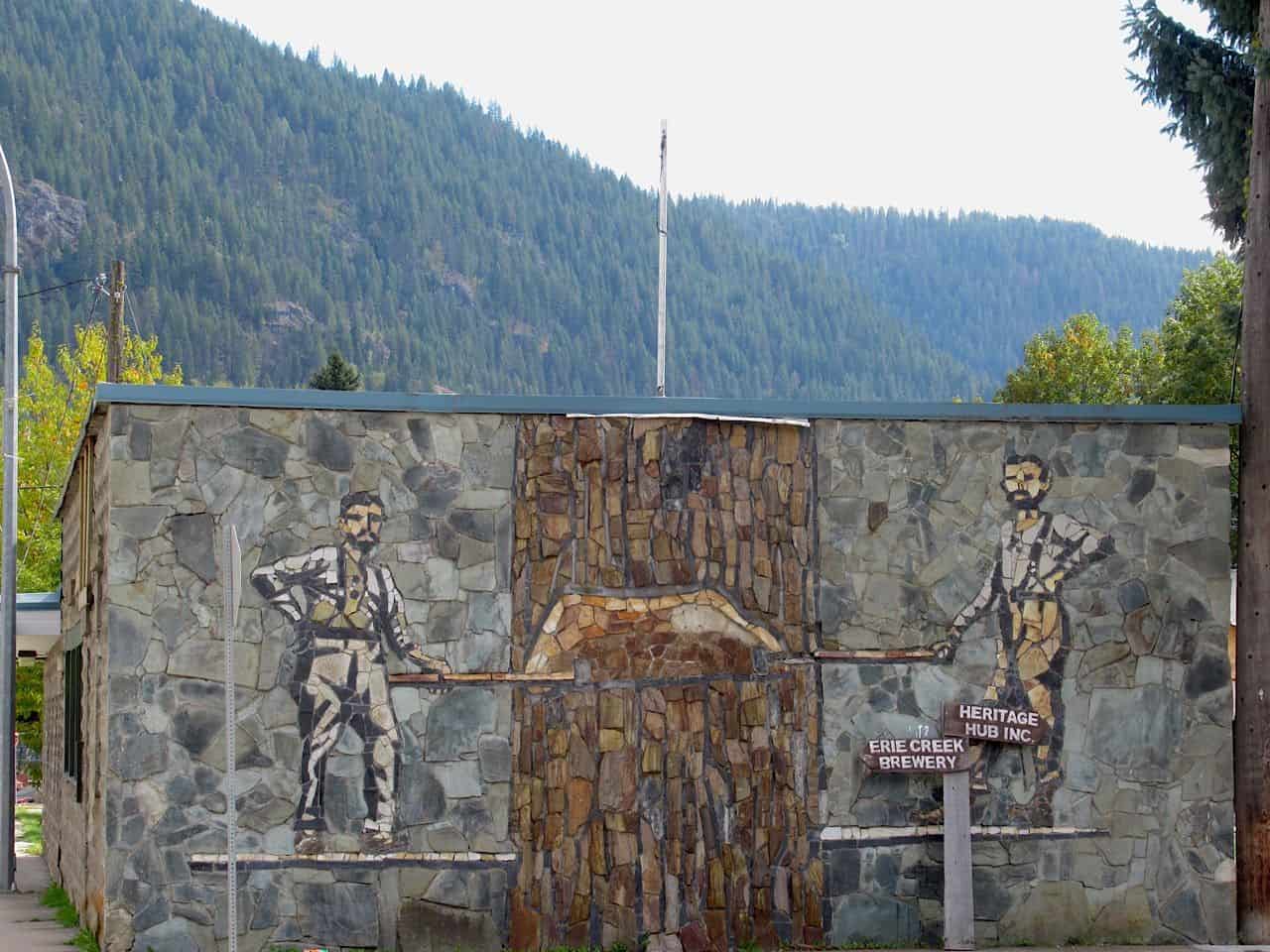 Springboard loggers stone mural in Salmo BC Canada.