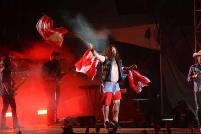Country music artist takes the Canada crowd to a new level of frenzy when the flags came out on stage in 2018
