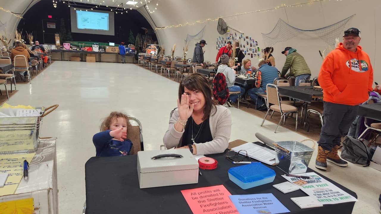 Little Seeker Big Helper - Our little adventure seeker is always looking for ways to help others. She decided to hop up and help at the check-in desk for the spaghetti supper on Saturday night at the community centre in Rochon Sands. 