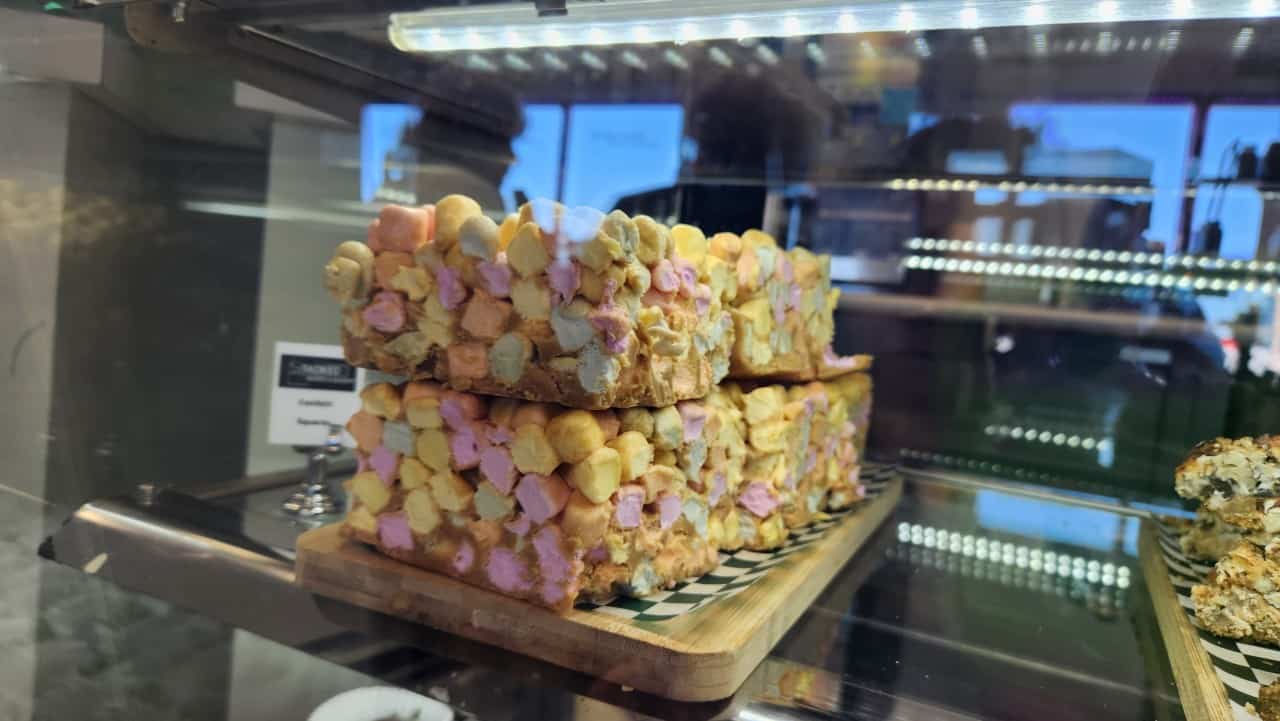 The Biggest Confetti Squares Ever! - These have to be the largest confetti squares I have ever seen at a bakery! These delicious sweet treats are made with rainbow marshmallows and peanut butter. 