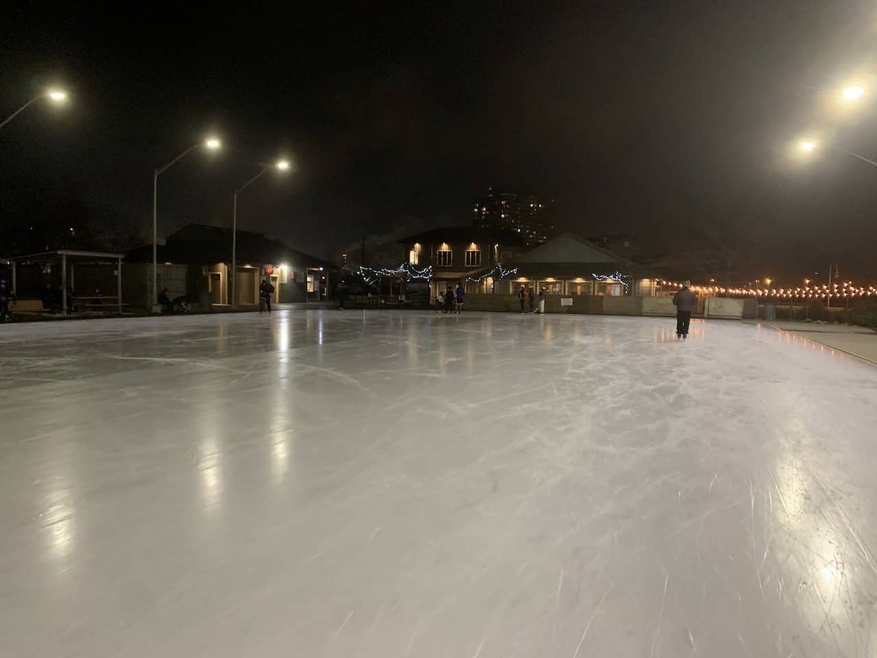 Wide Open Ice at the Outdoor Skating Rink at Pier 8 in Hamilton Ontario - The ice at the Outdoor Skating Rink in Hamilton, Ontario was not very busy on the evening we visited. This picture was taken before the evening skaters had arrived.