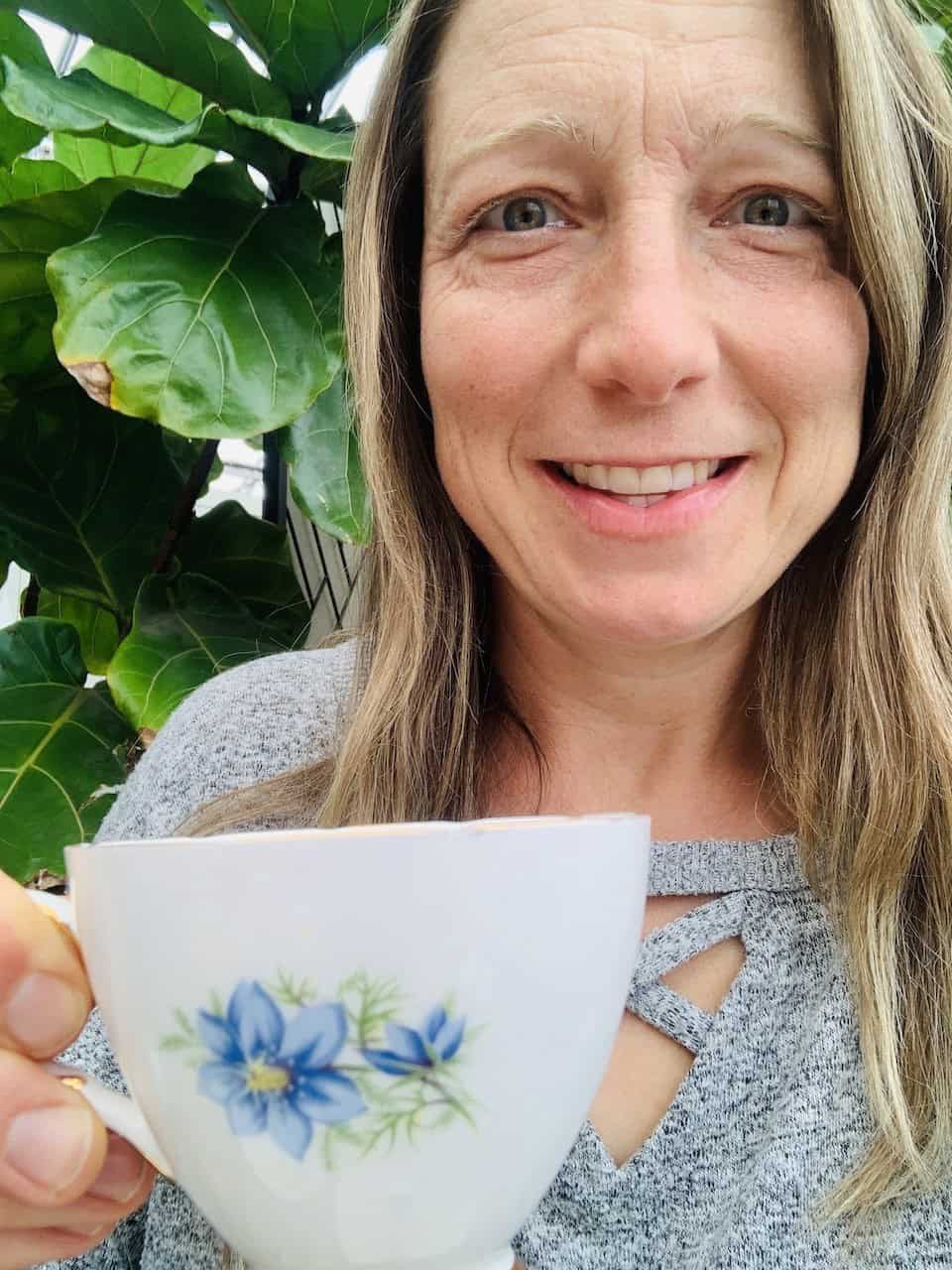 Enjoying Tea at the Watering Can Flower Market in Vineland Ontario Canada  - The Watering Can Flower Market boasts of celebrating the charm of mismatched fine bone teacups and saucers in Vineland, Ontario, Canada.