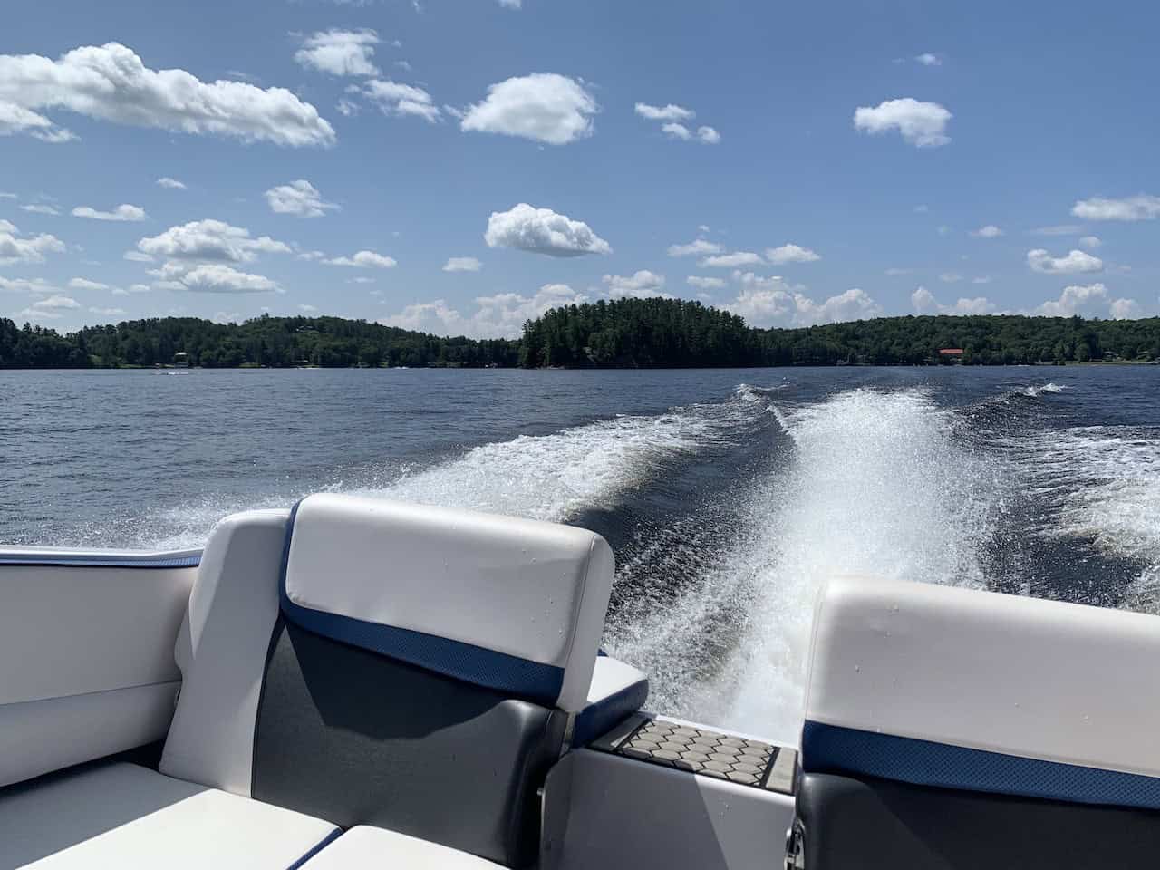 Boating on Mary Lake in Huntsville Ontario - Mary Lake is a beautiful spot to enjoy a day enjoying activities on the water in Huntsville, Ontario, Canada.