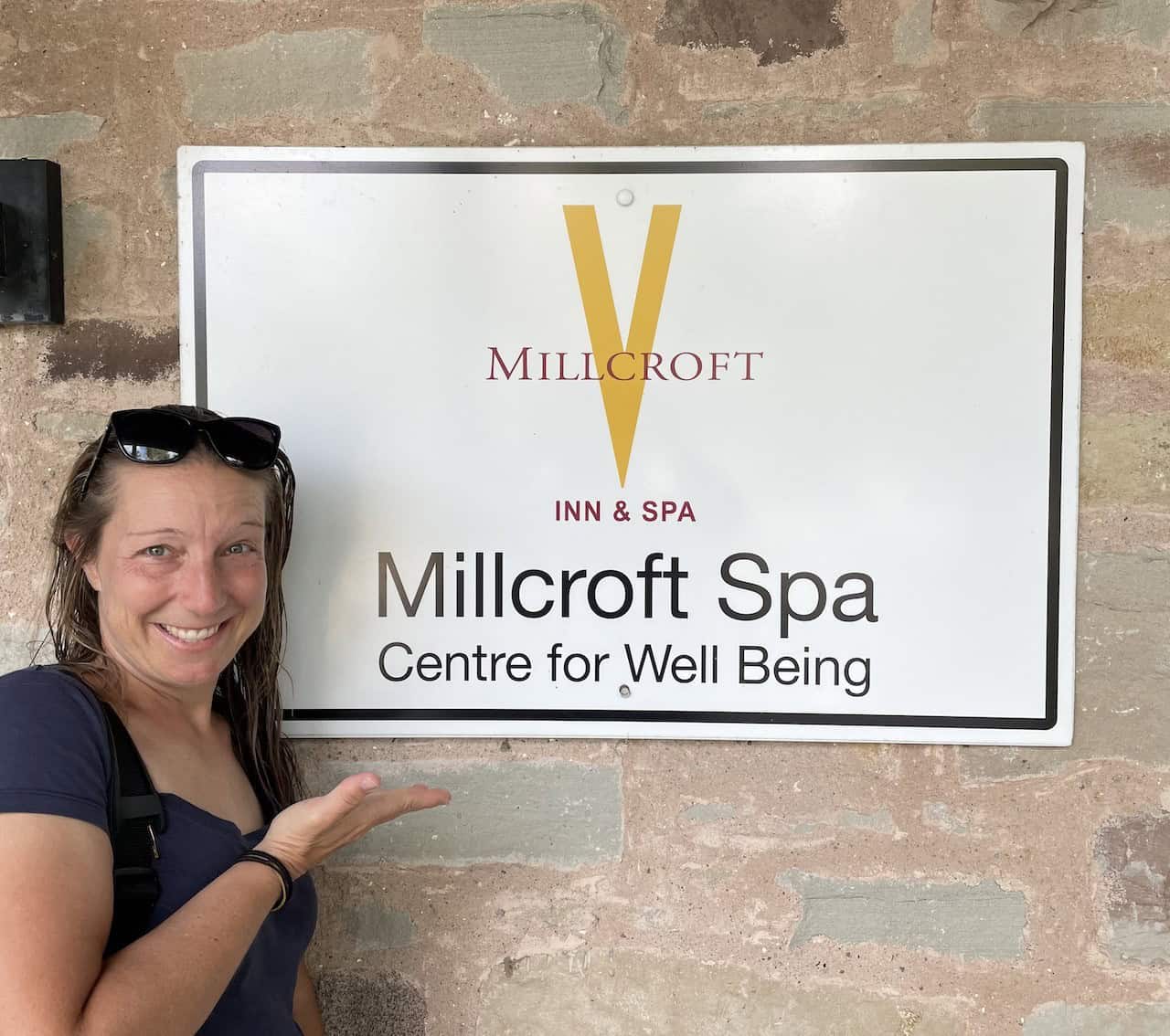 Millcroft Inn and Spa Entrance Sign - My smile by the Millcroft Spa sign is so big because I am looking forward to my massage and time in the hot spring pools.